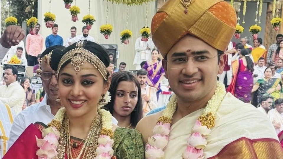 Tejasvi Surya having water during wedding ceremony happy couple
